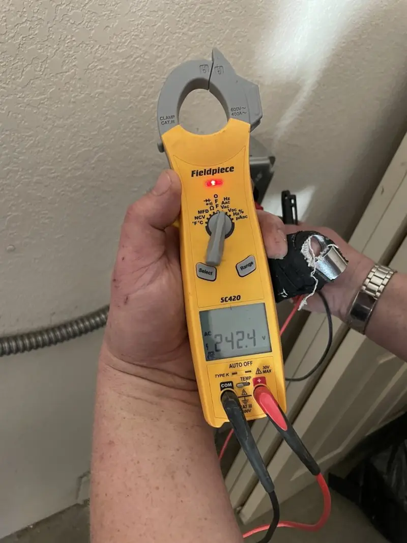 Voltage testing with clamp meter during Circuit Breaker Repair in Shillington